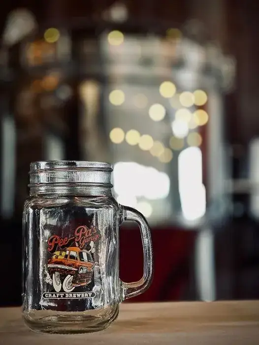 A Pee-Pa's Garage branded mug