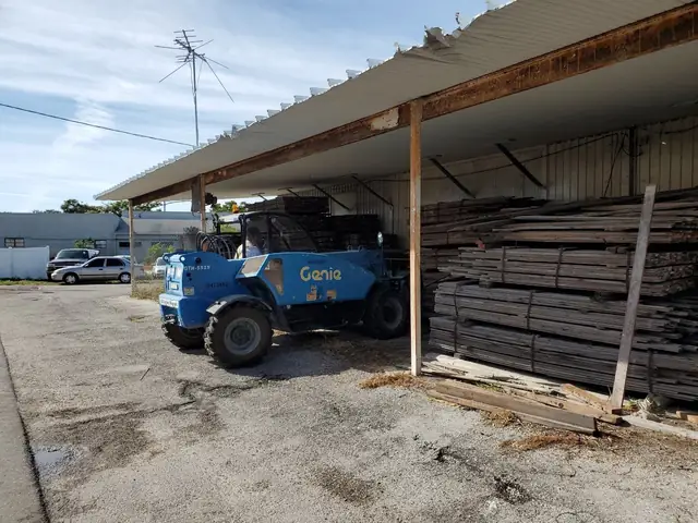 Forklift and lumber during the buildout