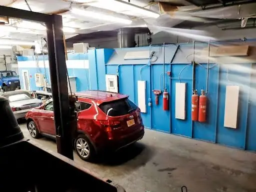 A classic car parked in the garage
