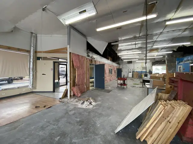 Lumber staged in the open room